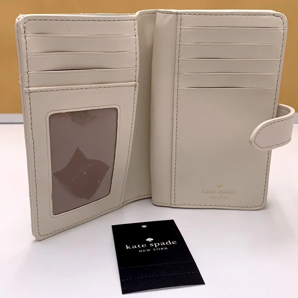 KATE SPADE Carey Medium Compact Bifold Wallet Parchment Color